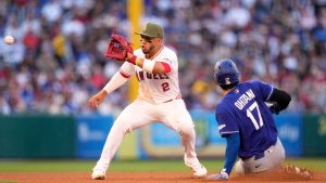 Los Angeles Dodgers' Shohei Ohtani, right, steals second as Los Angeles Angels second baseman Oswald Peraza takes a late throw during the third inning of a baseball game Saturday, May 16, 2026, in Anaheim, Calif. (Mark J. Terrill/AP)
