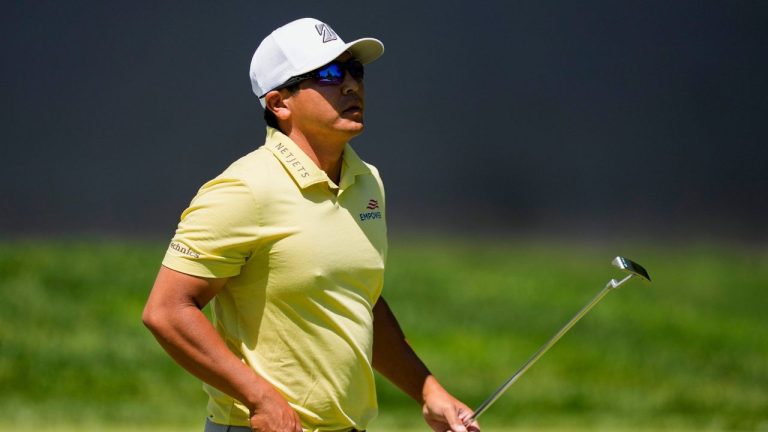Kurt Kitayama walks across the first green after his shot during the third round of the PGA Championship at Aronimink Golf Club, Saturday, May 16, 2026, in Newtown Square, PA. (Matt Slocum/AP)