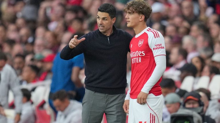Arsenal's manager Mikel Arteta talks to Arsenal's Max Dowman during the English Premier League soccer match between Arsenal and Fulham in London, England, Saturday, May 2, 2026. (Kin Cheung/AP)