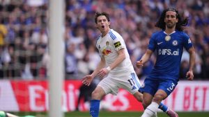 Leeds' Brenden Aaronson, centre, reacts after failing to score during the FA Cup semifinal soccer match between Chelsea and Leeds in London, England, Sunday, April 26, 2026. (Alastair Grant/AP)