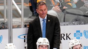 Vegas Golden Knights head coach Bruwsce Cassidy stands behind his bench during the third period of an NHL hockey game against the Pittsburgh Penguins in Pittsburgh, Sunday, March 1, 2026. (Gene J. Puskar/AP)