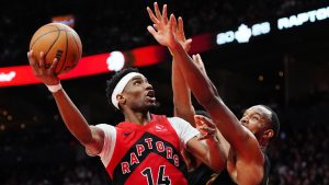Toronto Raptors' Ja'kobe Walter (14) shoots as Cleveland Cavaliers' Evan Mobley (4) defends during second half NBA playoff basketball action in Toronto on Friday, May 1, 2026. (Frank Gunn/CP)