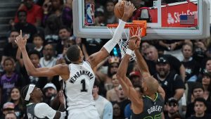 San Antonio Spurs forward Victor Wembanyama (1) scores over Minnesota Timberwolves center Rudy Gobert (27) during the first half in Game 2 of a second-round NBA playoffs basketball series in San Antonio, Wednesday, May 6, 2026. (Eric Gay/AP)