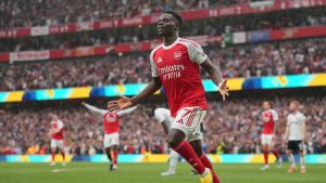 Arsenal's Bukayo Saka celebrates after scoring his side's second goal during the English Premier League soccer match between Arsenal and Fulham in London, England, Saturday, May 2, 2026. (Kin Cheung/AP)