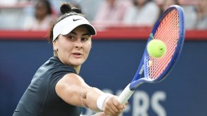 Bianca Andreescu, of Canada, plays a shot to Barbora Krejcikova, of the Czech Republic, during their first round match at the National Bank Open tennis tournament in Montreal, Sunday, July 27, 2025. (Graham Hughes/CP)