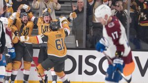 Vegas Golden Knights centre Tomas Hertl, left, celebrates his goal with teammates as Colorado Avalanche center Parker Kelly skates by during the third period in Game 3 of the Western Conference finals NHL hockey Stanley Cup playoff series Sunday, May 24, 2026, in Las Vegas. (Mark J. Terrill/AP)