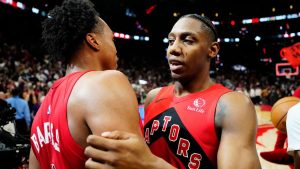Toronto Raptors' RJ Barrett (right) celebrates with Scottie Barnes (4) after defeating the Cleveland Cavaliers in overtime NBA playoff basketball action in Toronto on Friday, May 1, 2026. (Frank Gunn/CP)