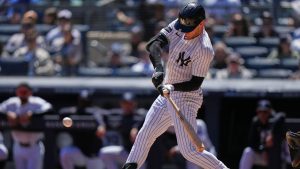 New York Yankees' Cody Bellinger hits an RBI triple during the first inning of a baseball game against the Texas Rangers Thursday, May 7, 2026, in New York. (Frank Franklin II/AP)