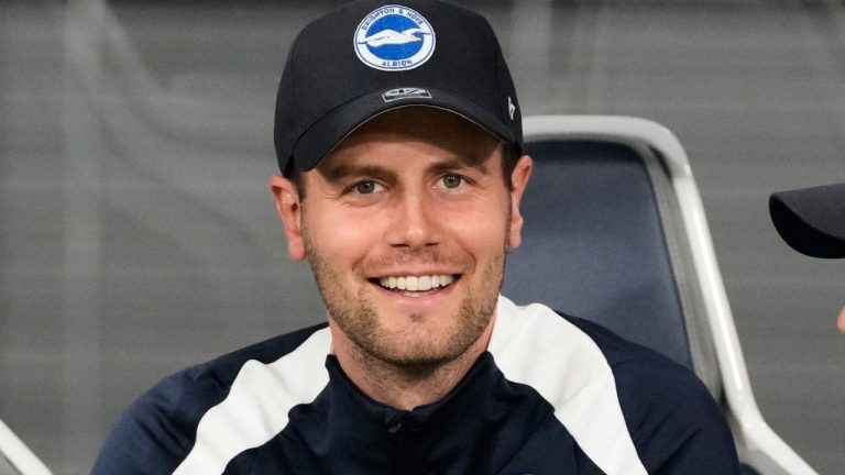 Brighton's coach Fabian Hurzeler smiles before a friendly soccer match against Kashima Antlers in Tokyo on July 24, 2024. (Shuji Kajiyama/AP)