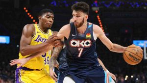 Oklahoma City Thunder center Chet Holmgren (7) works to the basket against Los Angeles Lakers forward Rui Hachimura (28) in the second half of Game 2 in a second-round NBA basketball playoffs series Thursday, May 7, 2026, in Oklahoma City. (Nate Billings/AP)