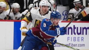 Colorado Avalanche defenceman Cale Makar, front, pursues the puck with Vegas Golden Knights centre Ivan Barbashev in the second period of an NHL hockey game, Wednesday, Nov. 27, 2024, in Denver. (David Zalubowski/AP)