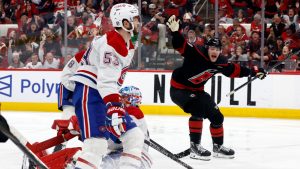 Carolina Hurricanes' Eric Robinson (50) reacts to the game wining overtime goal by Nikolaj Ehlers during overtime in Game 2 of the Eastern Conference final NHL hockey Stanley Cup playoff series in Raleigh, N.C., Saturday, May 23, 2026. (Karl DeBlaker/AP)