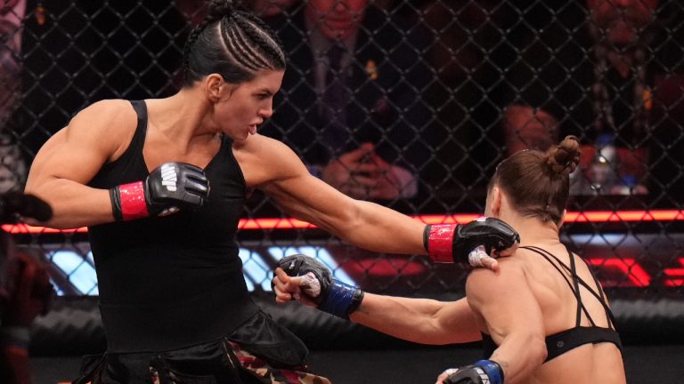 Gina Carano, of the United States, left, fights Ronda Rousey, of the United States, during their featherweight mixed martial arts fight Saturday, May 16, 2026, in Inglewood, Calif. (Jae C. Hong/AP)