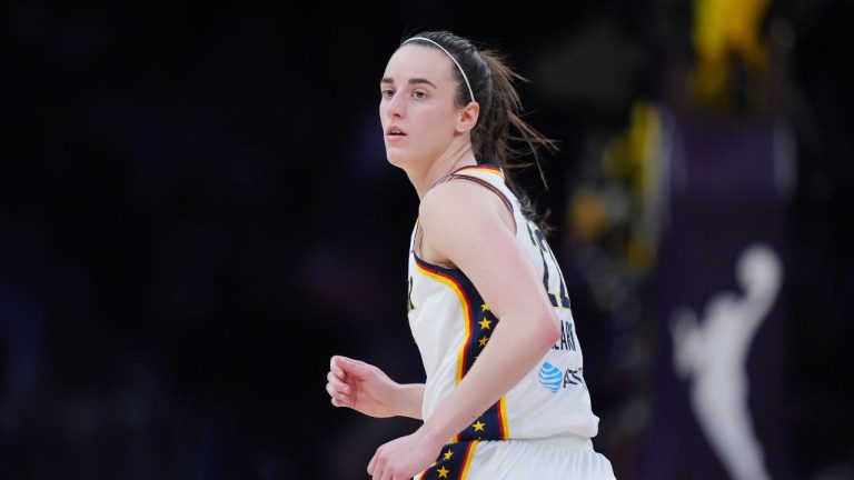 Indiana Fever guard Caitlin Clark (22) jogs up the court during the first half of a WNBA basketball game against the Los Angeles Sparks Wednesday, May 13, 2026, in Los Angeles. (Jae C. Hong/AP Photo)