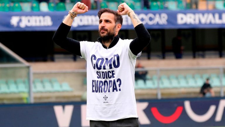 Como's coach Cesc Fabregas wears a jersey reading "Como means Europe?" as he celebrates with fans after his team clinched a berth in the UEFA competitions, at the end of the Serie A soccer match between Hellas Verona and Como, in Verona, Italy, Sunday, May 10, 2026. (Paola Garbuio/LaPresse via AP)