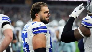 Dallas Cowboys offensive tackle Dakoda Shepley smiles on the sidelines during the second half of a football game against the Tampa Bay Buccaneers. (Jeffrey McWhorter/AP)