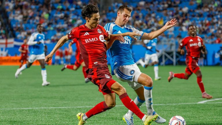 Toronto FC forward Daniel Salloi, left, shoots against Charlotte FC defender Andrew Privett, right, during the second half of an MLS soccer match in Charlotte, N.C., Saturday, May 16, 2026. (Nell Redmond/AP)