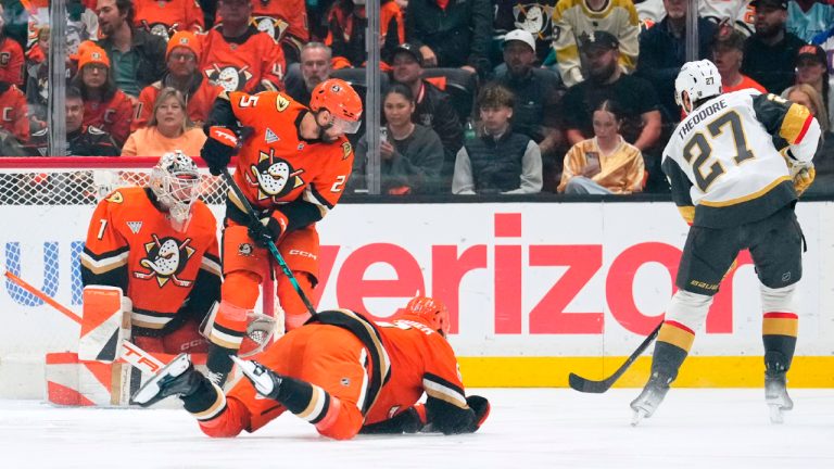 Vegas Golden Knights defenceman Shea Theodore, right, scores on Anaheim Ducks goaltender Lukas Dostal, left, during the first period in Game 3 of a second-round NHL hockey Stanley Cup playoff series Friday, May 8, 2026, in Anaheim, Calif. (Mark J. Terrill/AP)