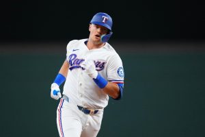 Texas Rangers' Josh Jung runs the bases after hitting a solo home run against the Chicago Cubs during the second inning of a baseball game Saturday, May 9, 2026, in Arlington, Texas. (Julio Cortez/AP)