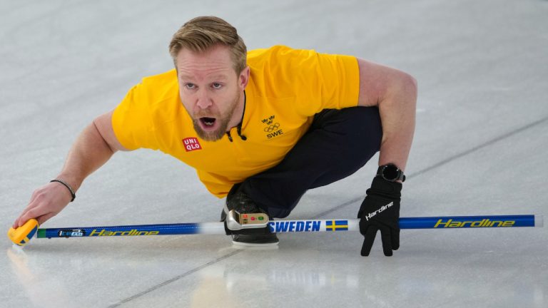 Sweden's Niklas Edin in action during the men's curling round robin session against Switzerland, at the 2026 Winter Olympics, in Cortina d'Ampezzo, Italy, Tuesday, Feb. 17, 2026. (Misper Apawu/AP)