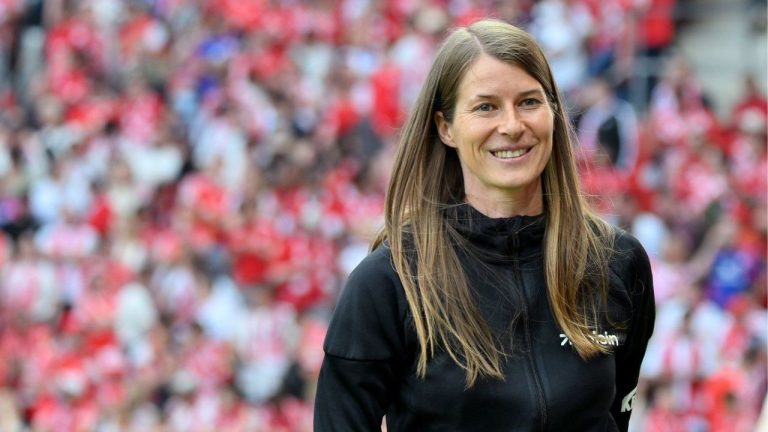 Union Berlin's coach Marie-Louise Eta smiles before the German Bundesliga soccer match between 1. FSV Mainz 05 and 1. FC Union Berlin in Mainz, Germany, Saunday, May 10, 2026. (Torsten Silz/dpa via AP)
