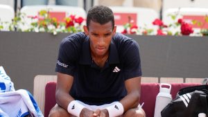 Canada's Felix Auger-Aliassime sits as he reacts during the match against Argentina's Mariano Navone at the Italian Open tennis tournament in Rome, Saturday, May 9, 2026. (Alessandra Tarantino/AP)