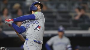 Toronto Blue Jays shortstop Andrés Giménez swings while at bat during the ninth inning of a baseball game against the New York Yankees, Tuesday, May 19, 2026, in New York. (AP Photo/Heather Khalifa)