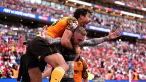 Hull City's Oliver McBurnie celebrates scoring their side's first goal of the game during the Championship play-off final between Hull City and Middlesbrough at Wembley Stadium, London, Saturday May 23, 2026. (John Walton/PA via AP)