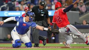 Toronto Blue Jays catcher Brandon Valenzuela (59) tags out Los Angeles Angels' Jorge Soler (12) as he grounds out at home plate during second inning MLB baseball action in Toronto, Saturday, May 9, 2026. (Chris Young/THE CANADIAN PRESS)