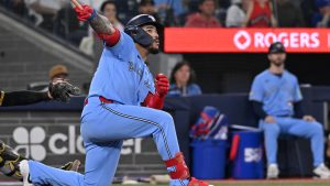 Toronto Blue Jays outfielder Yohendrick Pinango (24) watches the flight of the ball after hitting a double against the Pittsburgh Pirates during first inning MLB baseball action in Toronto on Saturday, May 23, 2026. (Jon Blacker/CP)
