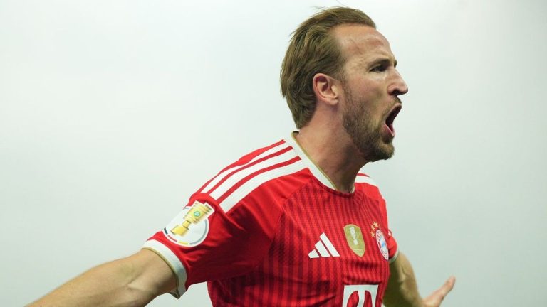 Bayern's Harry Kane celebrates after scoring during the German Cup final soccer match between VfB Stuttgart and Bayern Munich in Berlin, Germany, Saturday, May 23, 2026. (Michael Kappeler/dpa via AP)