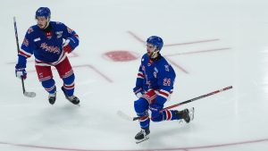 Kitchener Rangers' Jack Pridham (24) and Christian Humphreys (48) celebrate Pridham's goal during the third period of the Memorial Cup final hockey game, in Kelowna, B.C., on Sunday, May 31, 2026. (Darryl Dyck/THE CANADIAN PRESS)