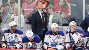 Edmonton Oilers head coach Kris Knoblauch looks on with Evander Kane, left to right, Ryan Nugent-Hopkins, Leon Draisaitl and Connor McDavid during the third period in Game 6 of the Stanley Cup final against the Florida Panthers in Sunrise, Fla., on Tuesday, June 17, 2025. (Nathan Denette/CP)