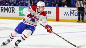 Montreal Canadiens defenceman Lane Hutson (48) carries the puck during the second period in Game 5 of a second-round NHL hockey Stanley Cup playoff series against the Buffalo Sabres Thursday, May 14, 2026, in Buffalo, N.Y. (Jeffrey T. Barnes/AP)