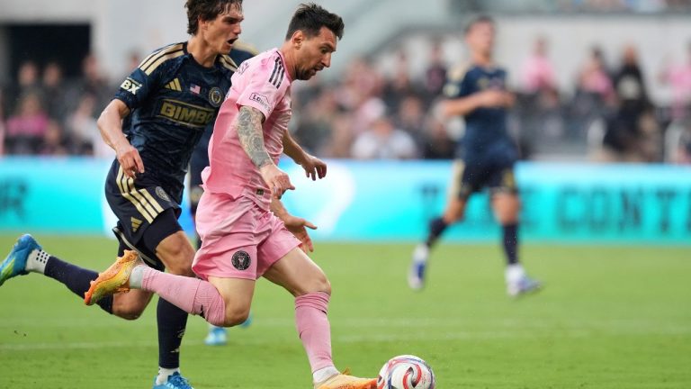 Inter Miami forward Lionel Messi (10) drives downfield under pressure from Philadelphia Union midfielder Ben Bender (16) during the first half of an MLS soccer match, Sunday, May 24, 2026, in Miami. (Rebecca Blackwell/AP)