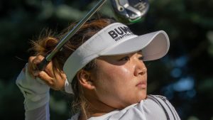 Soo Bin Joo of Korea watches her tee shot on the 18th hole in the first round of the Canadian Women's Open at Mississaugua Golf and Country Club in Mississauga, Ont., Thursday, Aug. 21, 2025. (Frank Gunn/THE CANADIAN PRESS)