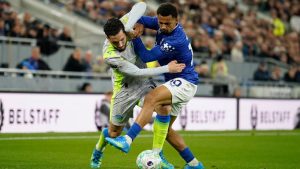 Manchester City's Rayan Cherki, left, and Everton's Iliman Ndiaye fight for the ball during the Premier League soccer match between Manchester City and Everton in Liverpool, England, Monday, May 4, 2026. (Dave Thompson/AP Photo)