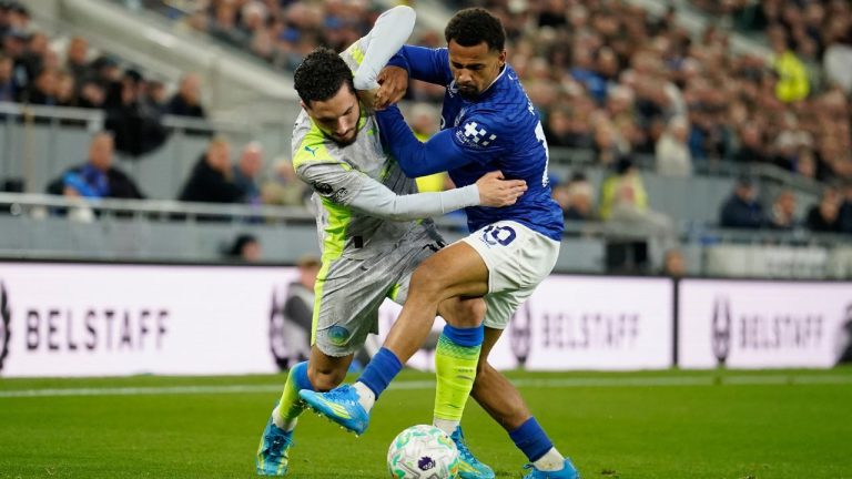 Manchester City's Rayan Cherki, left, and Everton's Iliman Ndiaye fight for the ball during the Premier League soccer match between Manchester City and Everton in Liverpool, England, Monday, May 4, 2026. (Dave Thompson/AP Photo)