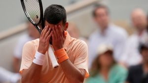 Novak Djokovic of Serbia reacts as he plays against Joao Fonseca of Brazil during their third round men's singles tennis match at the French Open tennis tournament in Paris, Friday, May 29, 2026. (Christophe Ena/AP)