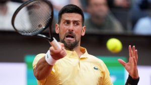 Serbia's Novak Djokovic returns the ball to Croatia's Dino Prizmic during their match at the Italian Open tennis tournament, in Rome, Friday, May 8, 2026. (Andrew Medichini/AP)