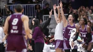 Toronto Tempo guard Kia Nurse (11) cheers from the bench after her teammate made a basket against the Connecticut Sun during first half pre-season WNBA basketball action in Toronto on Wednesday, April 29, 2026. (Nathan Denette/CP)