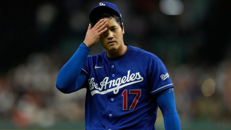 Los Angeles Dodgers starting pitcher Shohei Ohtani returns to the dugout after the first inning of a baseball game against the Houston Astros in Houston, Tuesday, May 5, 2026. (Ashley Landis/AP Photo)