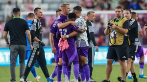 Orlando City players celebrate together at the end of the second half during an MLS soccer match against the Inter Miami, Saturday, May 2, 2026, in Miami. (Chris Arjoon/AP)