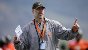 B.C. Lions head coach Buck Pierce speaks to players during the opening day of the CFL football team's training camp, in Kamloops, B.C., on Sunday, May 10, 2026. (Darryl Dyck/THE CANADIAN PRESS)