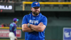 Toronto Blue Jays manager John Schneider walks back from the mound during a baseball game against the Arizona Diamondbacks Friday, April 17, 2026, in Phoenix. (Darryl Webb/AP Photo)
