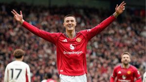 Manchester United's Benjamin Sesko celebrates after scoring his side's second goal during the English Premier League soccer match between Manchester United and Liverpool in Manchester, England, Sunday, May 3, 2026. (Dave Thompson/AP)