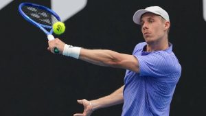 Denis Shapovalov of Canada plays a forehand return to Bu Yunchaokete of China during their first round match at the Australian Open tennis championship in Melbourne, Australia, Monday, Jan. 19, 2026. (Aaron Favila/AP)