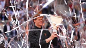 Jannik Sinner, of Italy, holds the trophy after winning the men's singles tennis final match against Alexander Zverev, of Germany, at the Madrid Open tennis tournament in Madrid, Spain, Sunday, May 3, 2026. (Manu Fernandez/AP)