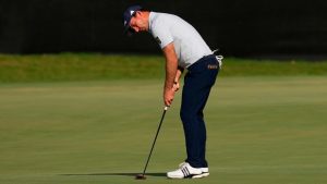 Nick Taylor, of Canada, putts on the 18th green during the first round of the Cadillac Championship PGA golf tournament Thursday, April 30, 2026, in Doral, Fla. (David J. Phillip/AP Photo)