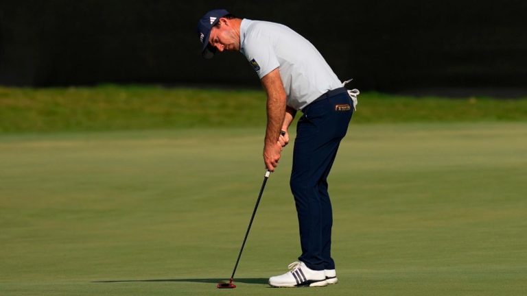 Nick Taylor, of Canada, putts on the 18th green during the first round of the Cadillac Championship PGA golf tournament Thursday, April 30, 2026, in Doral, Fla. (David J. Phillip/AP Photo)